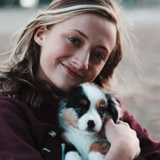 girl with puppy